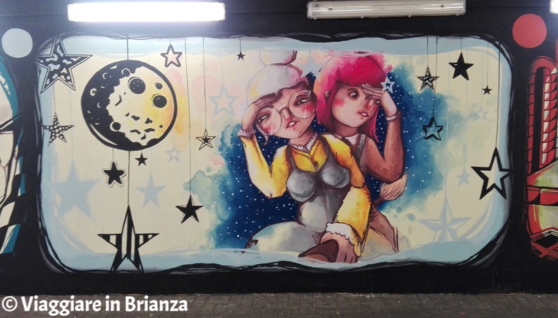 Murales a Seregno, la Befana e Teresa nella Freccia Azzurra